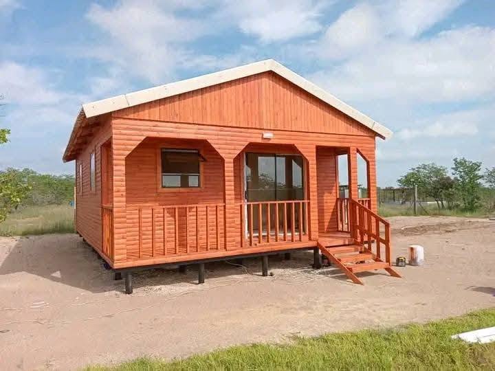 Log Cabins project 7 by Hot Mix Holdings
